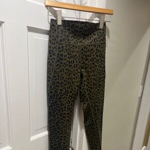 GapFIT Green and black cheetah power leggings.